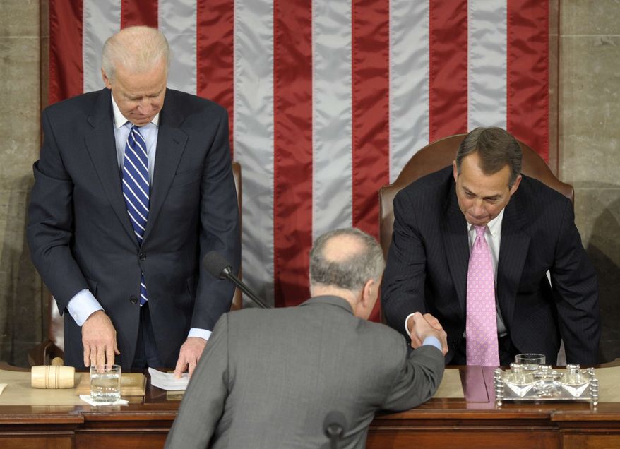 In this photo from Jan. 4, 2013, Vice President Joseph R. Biden watches at left as Sen. Charles Schumer, D-N.Y., center, shakes hands with House Speaker John Boehner of Ohio, right, in the House Chamber during the counting of Electoral College votes on Capitol Hill in Washington. Biden presided over a Joint Session of Congress Friday as four members of the House and Senate took turns announcing the votes that had been tallied in state capitals last month affirming the re-election of Barack Obama as President of the United States. (AP Photo/Susan Walsh)
