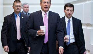 House Speaker John A. Boehner of Ohio walks to a strategy session for Republican House members Friday. Lack of a clear leader with a unifying vision for the party going forward has spurred dissension in the ranks in the wake of the November elections, in which the party retained control of the House, though with a smaller majority. “It’s disappointing to see infighting in the party,” said a GOP operative who was an aide to the party’s 2012 presidential nominee. (Associated Press)
