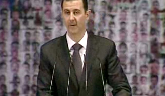 ** FILE ** Syrian President Bashar Assad (Associated Press)