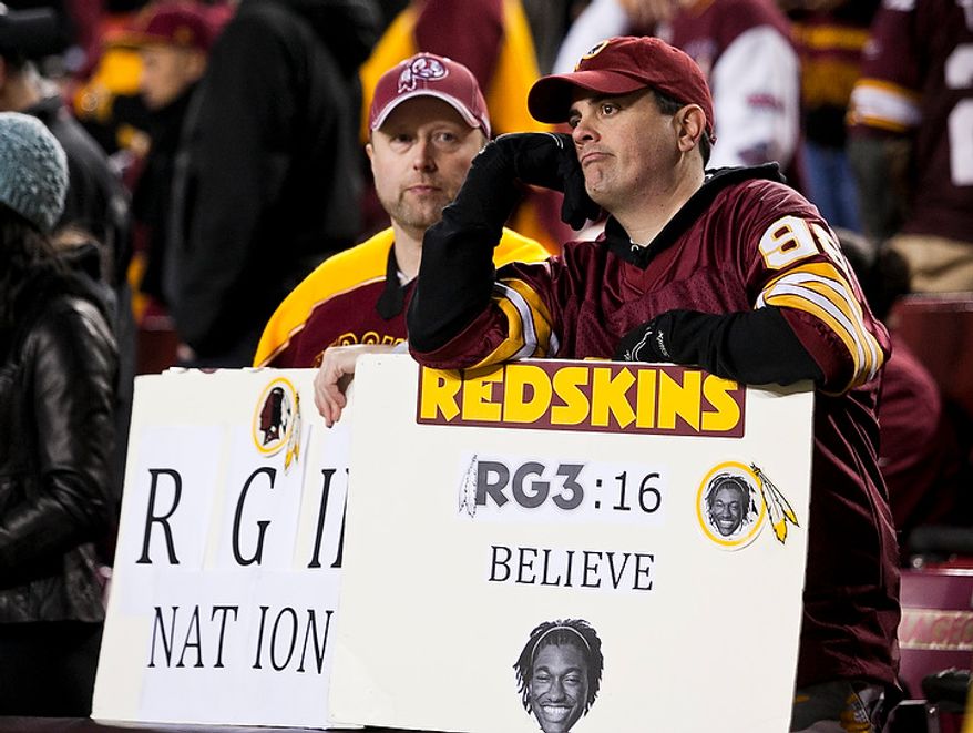 Washington Redskins fans react to a 24 to 14 lose to the Seattle Seahawks in the NFC wild card game at FedEx Field, Landover, Md., Sunday, January 6, 2013. (Craig Bisacre/The Washington Times)