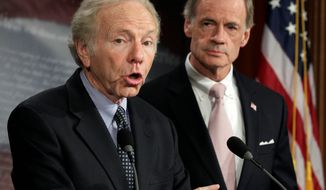 Sen. Thomas R. Carper (right), Delaware Democrat, succeeds the now-retired Sen. Joe Lieberman, Connecticut independent, as chairman of the Senate Homeland Security and Governmental Affairs Committee. The ranking Republican is also new. (Associated Press)