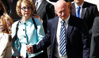 ** FILE ** Former Rep. Gabrielle Giffords and her husband, former astronaut Mark Kelly, announced Tuesday they are launching the Americans for Responsible Solutions PAC, an advocacy group to fight gun violence. (Associated Press)