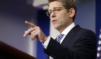 White House press secretary Jay Carney gestures as he speaks during his daily news briefing at the White House in Washington on Wednesday, Jan. 9, 2013. (AP Photo/Charles Dharapak)