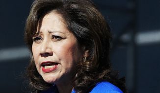 **FILE** Labor Secretary Hilda Solis addresses employees outside the Flat Rock Assembly in Flat Rock, Mich., on Sept. 10, 2012. (Associated Press)