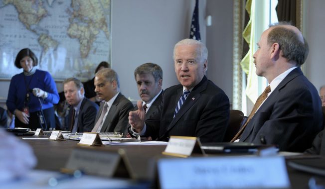 President Joe Biden, second from right, gestures as he speaks during a meeting with Sportsmen and Women and Wildlife Interest Groups and member of his cabinet, Thursday, Jan. 10, 2013, in the Eisenhower Executive Office Building on the White House complex in Washington. (AP Photo/Susan Walsh)