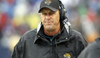 **FILE** Jacksonville Jaguars head coach Mike Mularkey watches the first half of Jacksonville&#39;s 34-18 loss to the Buffalo Bills in Orchard Park, N.Y., on Dec. 2, 2012. (Associated Press)