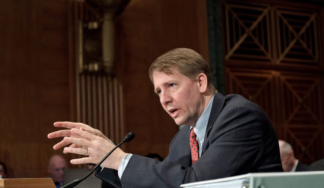 Consumer Financial Protection Bureau Director Richard Cordray said an effort was made to hit a balance between the abuses that once made mortgages too easy to get and overly strict standards that hampered borrowers with good credit. (Associated Press)