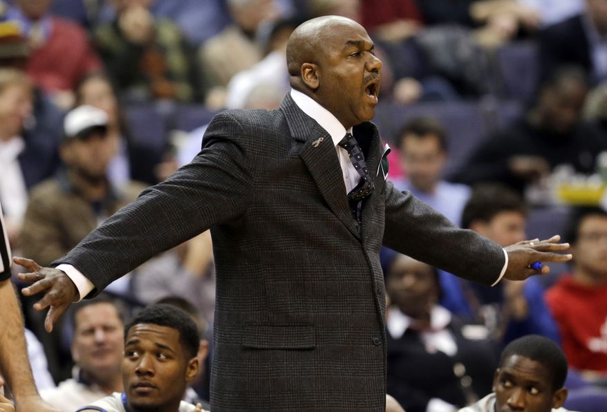 Georgetown coach John Thompson III talks to his players during the second half of an NCAA college basketball game against Pittsburgh Tuesday, Jan. 8, 2013, in Washington. Pittsburgh won 73-45. (AP Photo/Alex Brandon)
