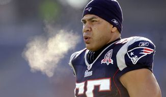 ** FILE ** In this Jan. 10, 2010, file photo, New England Patriots linebacker Junior Seau (55) warms up on the field before an NFL wild-card playoff football game in Foxborough, Mass. Star linebacker Junior Seau had a degenerative brain disease when he committed suicide last May, the National Institutes of Health told The Associated Press on Thursday, Jan. 10, 2013. (AP Photo/Charles Krupa, File)