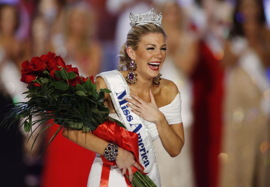 Miss New York Mallory Hagan reacts after being crowned Miss America 2013 on Saturday, Jan. 12, 2013, in Las Vegas. (AP Photo/Isaac Brekken)