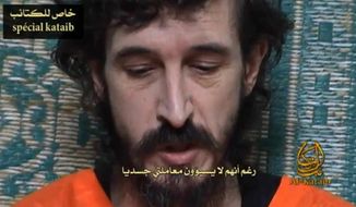 ** FILE ** In this undated file image from a video posted on Islamic militant websites, a man identified as French security agent Denis Allex pleads for his release from the Somali militant group al-Shabaab who have been holding him for nearly a year. (AP Photo, File)