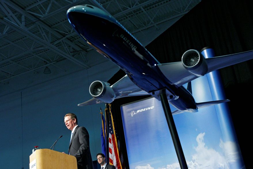 Ross Bogue, vice president and general manager for Boeing Fabrication celebrates the opening of a new manufacturing plant in West Jordan, Utah, on Friday, Jan. 11, 2013, where the horizontal stabilizers will be manufactured for the 787 Dreamliner. The U.S. government stepped in Friday to assure the public that Boeing's new 787 is safe to fly, even as it launched a comprehensive review to find out what caused a fire, a fuel leak and other worrisome incidents earlier in the week. (AP Photo/The Salt Lake Tribune, Francisco Kjolseth)
