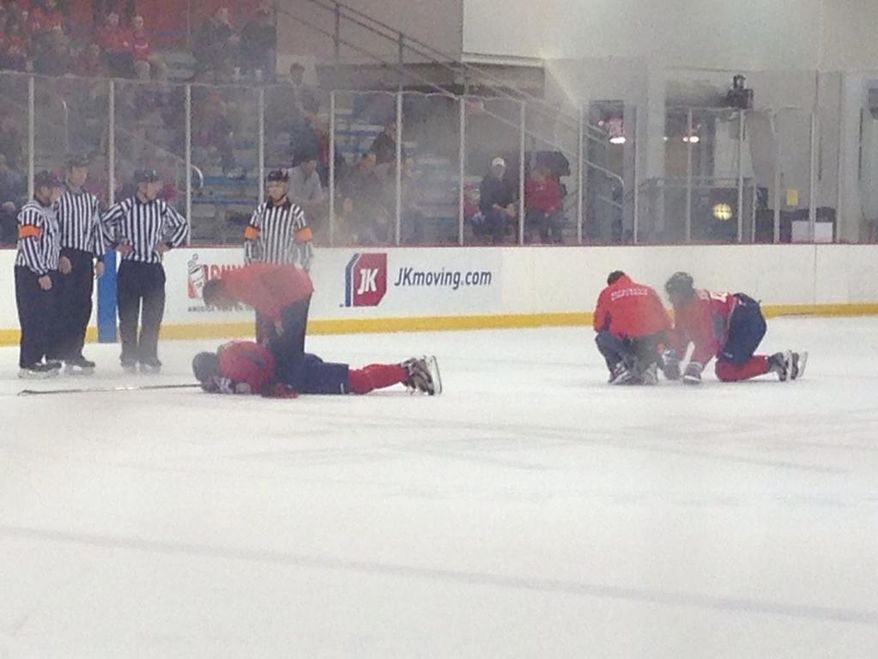 Alex Ovechkin (left) and Marcus Johansson collided during the Capitals' training camp scrimmage Tuesday. (Stephen Whyno / The Washington Times)