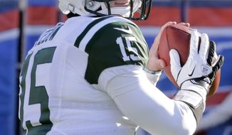 ** FILE **  In a Sunday, Dec. 30, 2012, file photo, New York Jets quarterback Tim Tebow (15) warms up before of an NFL football game against the Buffalo Bills, in Orchard Park, N.Y. (AP Photo/Gary Wiepert)