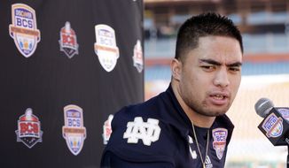 ** FILE ** Notre Dame linebacker Manti Te&#x27;o answers a question during Media Day for the BCS National Championship college football game on Saturday, Jan. 5, 2013, in Miami. (AP Photo/David J. Phillip)