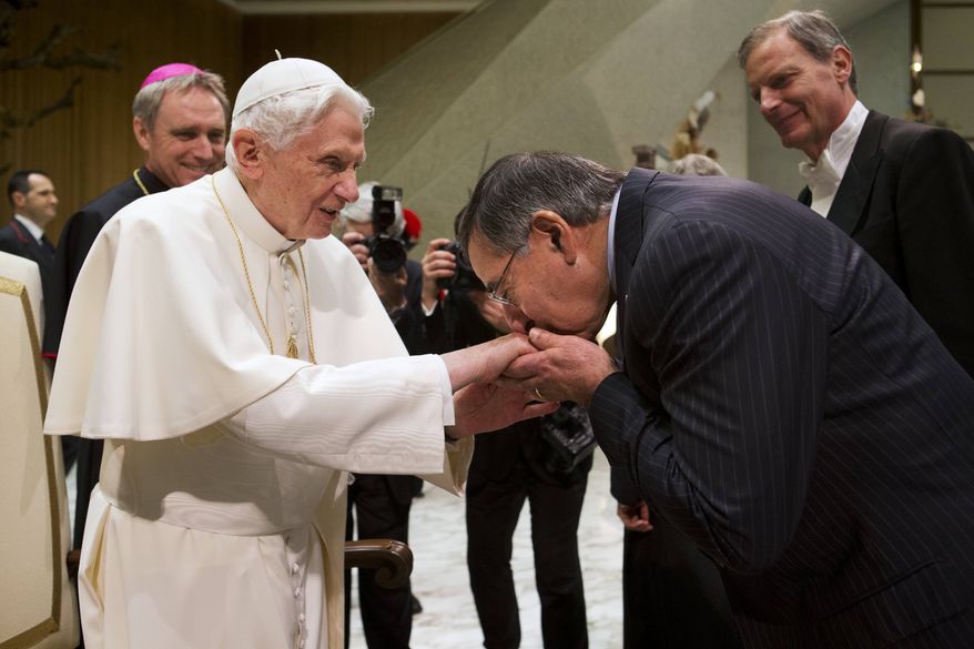 Pope Benedict XVI greets U.S. Defense Secretary Leon E. Panetta after the pontiff's weekly general audience in Paul VI Hall at the Vatican on Wednesday, Jan. 16, 2013. (AP Photo/Jacquelyn Martin)