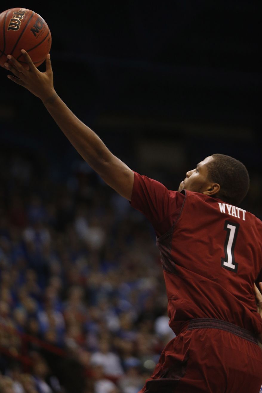 Temple guard Khalif Wyatt (1) during the second half of an NCAA college basketball game against the Kansas in Lawrence, Kan., Sunday, Jan. 6, 2013. Kansas defeated Temple 69-62. (AP Photo/Orlin Wagner)