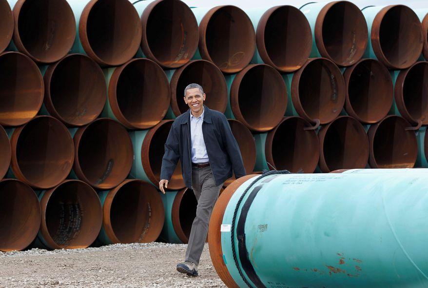 ** FILE ** President Obama visits the TransCanada Stillwater Pipe Yard in Cushing, Okla., in March 2012. (Associated Press)
