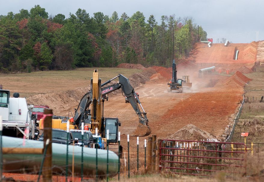 ** FILE ** Work has begun on the Keystone XL pipeline near Winona, Texas, but whether it will ever carry oil sands from central Canada to Gulf Coast refineries awaits a decision by President Obama. (Tyler [Texas] Morning Telegraph via Associated Press)