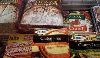 This photo from Nov. 11, 2008, shows gluten-free frozen pizza, one of hundreds of items at Gluten Free Trading Co. in Milwaukee. (Associated Press)