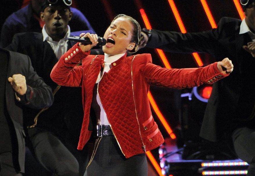 **FILE** Alicia Keys performs Jan. 9, 2013, at the People's Choice Awards in Los Angeles. (Associated Press/Invision)