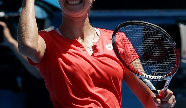 Russia&#x27;s Ekaterina Makarova celebrates after defeating Germany&#x27;s Angelique Kerber in their fourth round match at the Australian Open tennis championship in Melbourne, Australia, Sunday, Jan. 20, 2013. (AP Photo/Dita Alangkara)