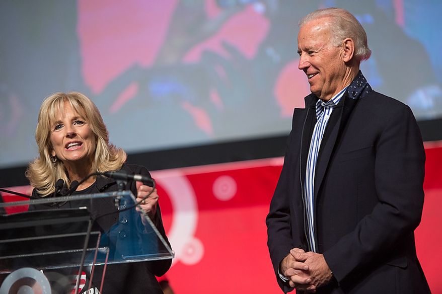 Vice President Joseph Biden and his wife Jill Biden take the stage to speak to volunteers who put together service packages for members of the armed services abroad during the National Day of Service at the D.C. Armory, Washington, D.C., Saturday, January 19, 2013. Non-profit groups are running hundreds of service projects for the Martin Luther King Jr. weekend. (Andrew Harnik/The Washington Times)
