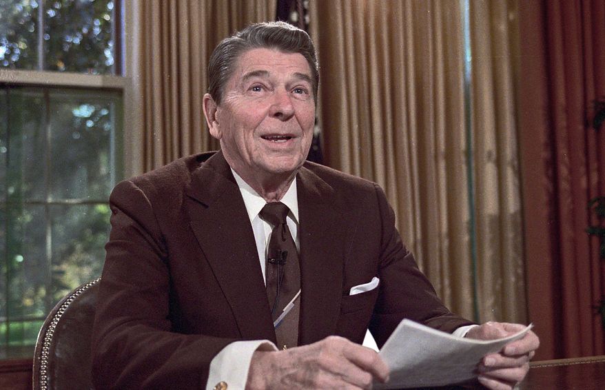 ** FILE ** “We must act today in order to preserve tomorrow,” President Reagan said during his first inaugural address, Jan. 20, 1981. (Associated Press)