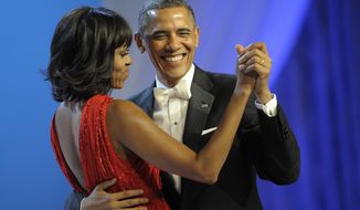 President Obama dances with first lady Michelle Obama during the Inaugural Ball at the Washignton Convention Center during the 57th Presidential Inauguration in Washington on Jan. 21, 2013. (Associated Press)