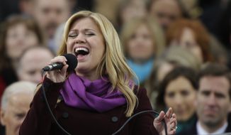 Singer Kelly Clarkson performs at the ceremonial swearing-in for President Obama at the U.S. Capitol during the 57th Presidential Inauguration in Washington on Jan. 21, 2013. (Associated Press)