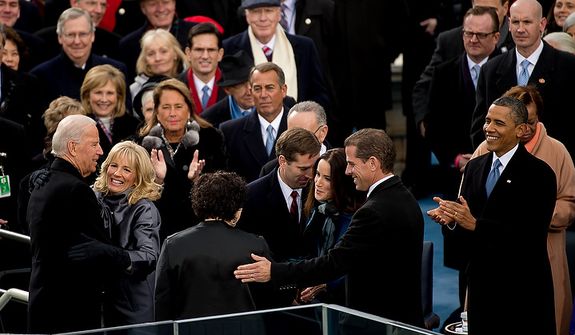 Vice President Joe Biden hugs his wife, Jill Biden after being sworn in for his second term on the West Lawn of the U.S. Capitol Building at the 57th Presidential Inauguration Ceremony, Washington, D.C., Monday, January 21, 2013. (Andrew Harnik/The Washington Times)