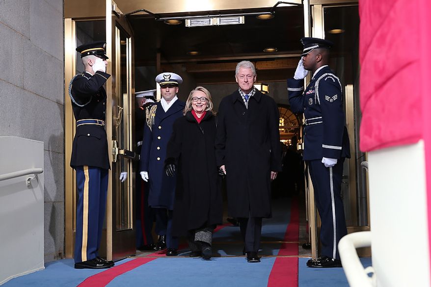 U.S. Secretary of State Hillary Clinton and former U.S. President Bill Clinton arrive during the presidential inauguration on the West Front of the U.S. Capitol January 21, 2013 in Washington, DC. Barack Obama was re-elected for a second term as President of the United States. (Photo by POOL Win McNamee/Getty Images)