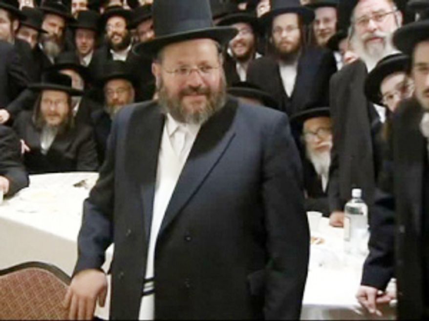 Nechemya Weberman attends a fundraiser on March 16, 2012, in the Brooklyn borough of New York, where his supporters contributed to a legal defense fund for his trial on charges of sexually abusing a girl he was supposed to be counseling. (AP Photo/WCBS-TV)