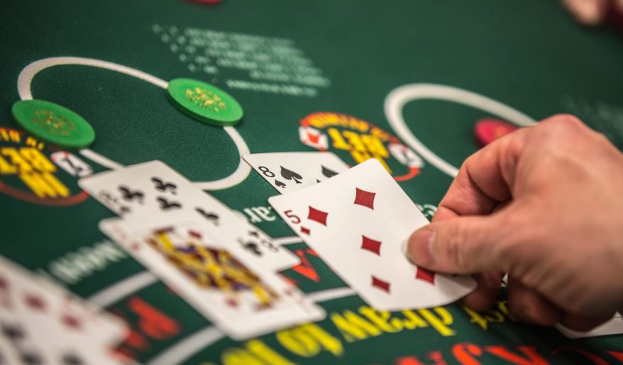 Dealers are taught proper card-handling techniques at a training session for casino dealers hosted by Maryland Live Casino in Glen Burnie, Md., on Tuesday, Jan. 22, 2013. These dealers will be auditioning for one of 1,200 new casino table jobs becoming available this spring. (Andrew S. Geraci/The Washington Times)