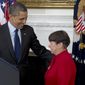 President Obama looks to Mary Jo White in the State Dining Room of the White House in Washington on Thursday, Jan. 24, 2013, as he announces he will nominate her to lead the Securities and Exchange Commission (SEC). (AP Photo/Carolyn Kaster)