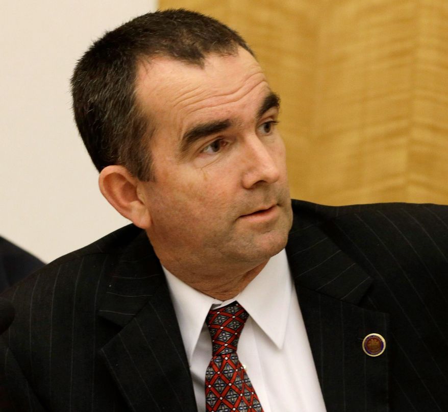 A bid by state Sen. Ralph Northam (right), Norfolk Democrat, to make pre-abortion ultrasounds optional was turned back by state Sen. Stephen H. Martin during a Privileges and Elections Committee special meeting on Monday. (Associated Press)