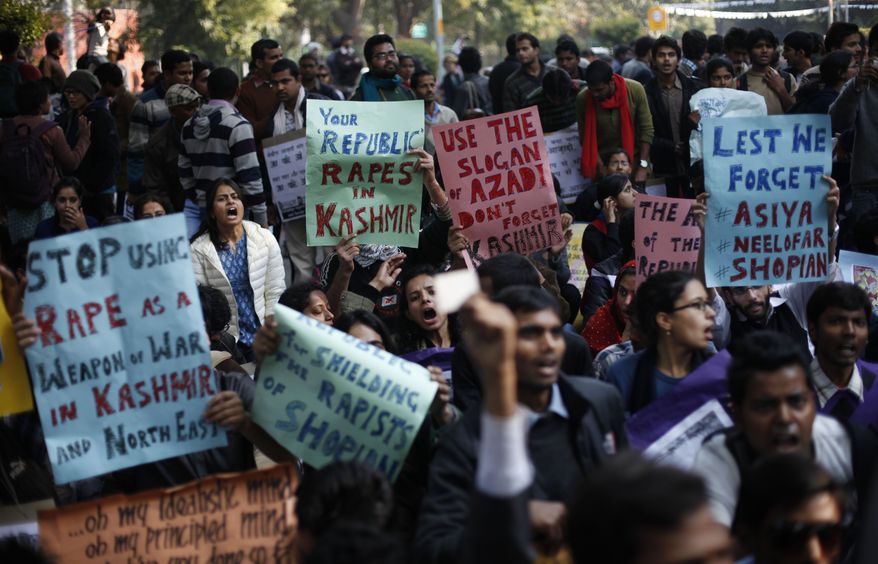 **FILE** Indians participate in a protest against gender discrimination and sexual violence in New Delhi on Jan. 26, 2013. The attack and brutal rape of a 23-year-old student in the heart of New Delhi in December has brought protesters into the streets demanding the government protect women and ensure those attacked get justice. (Associated Press)