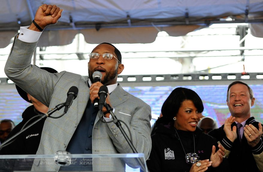 Baltimore Ravens linebacker Ray Lewis, left, addresses fans as Baltimore Mayor Stephanie Rawlings-Blake, center, and Maryland Gov. Martin O'Malley cheer during a send-off rally Monday, Jan. 28, 2013 in Baltimore. The team was leaving for New Orleans to play against the San Francisco 49ers in the Super Bowl. (AP Photo/Steve Ruark)