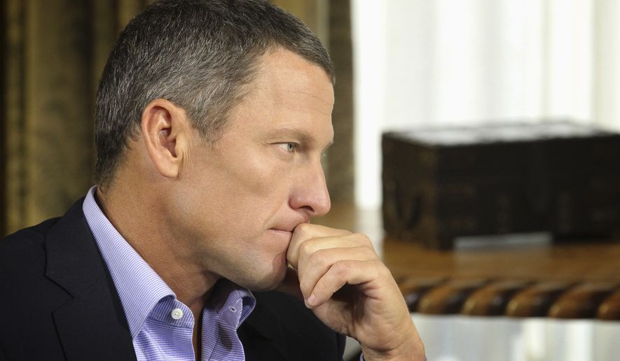 Lance Armstrong listens as he is interviewed by talk show host Oprah Winfrey during taping for the show &quot;Oprah and Lance Armstrong: The Worldwide Exclusive&quot; in Austin, Texas, in this Jan. 14, 2013, file photo. Armstrong confessed to using performance-enhancing drugs to win the Tour de France cycling during the interview that aired Jan. 17, 2013, reversing more than a decade of denial. (Associated Press/Harpo Studios, Inc.) ** FILE **