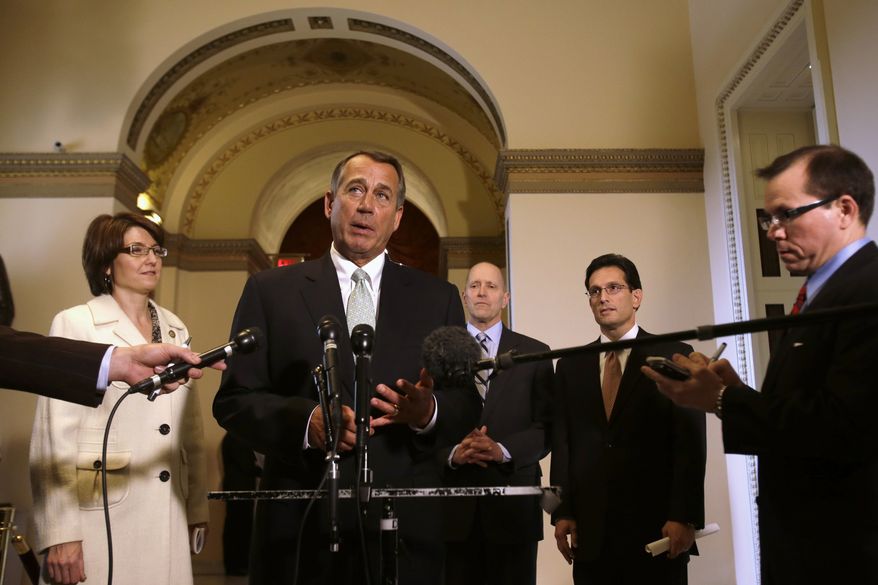 **FILE** House Speaker John Boehner (center), Ohio Republican, speaks Jan. 23, 2013, during a news conference on Capitol Hill to discuss the debt limit. The House overwhelmingly passed a bill earlier in the day to permit the government to borrow enough money to avoid a first-time default for at least four months, defusing a looming crisis setting up a springtime debate over taxes, spending and the deficit. From left are Reps. Cathy McMorris Rodgers, Washington Republican; Dave Camp, Michigan Republican and House Ways and Means Committee Chairman; and House Majority Leader Eric Cantor, Virginia Republican. (Associated Press)