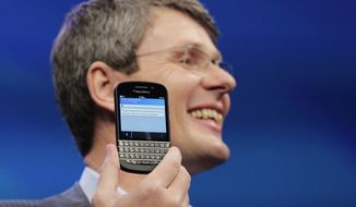 Thorsten Heins, CEO of Research in Motion, which is changing its name to BlackBerry, introduces the BlackBerry 10 on Wednesday, Jan. 30, 2013, in New York. (AP Photo/Mark Lennihan)