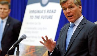 Virginia Gov. Bob McDonnell gestures “0” as he urges eliminating the state gasoline tax in favor of an increase in the state sales tax to fund transportation needs on Jan 8. (Associated Press)