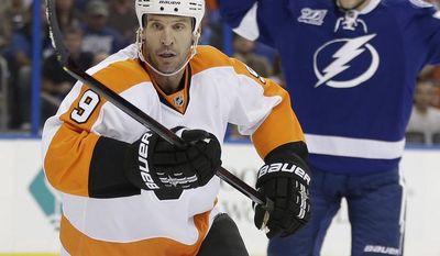 Philadelphia Flyers right wing Mike Knuble (9) during the first period of an NHL hockey game against the Tampa Bay Lightning Sunday, Jan. 27, 2013, in Tampa, Fla. (AP Photo/Chris O&#39;Meara)