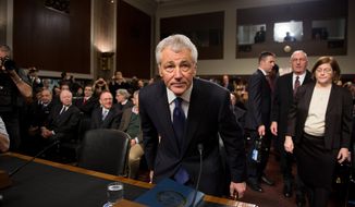 Former Sen. Chuck Hagel arrives on Capitol Hill in Washington on Thursday, Jan. 31, 2013, to testify before the Senate Armed Services Committee on his confirmation to be the next secretary of defense. (Andrew Harnik/The Washington Times)