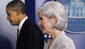 **FILE** President Obama and Health and Human Services Secretary Kathleen Sebelius leave the Brady Press Briefing Room of the White House in Washington on Feb. 10, 2012, after the president announced the revamp of his contraception policy requiring religious institutions to fully pay for birth control. (Associated Press)