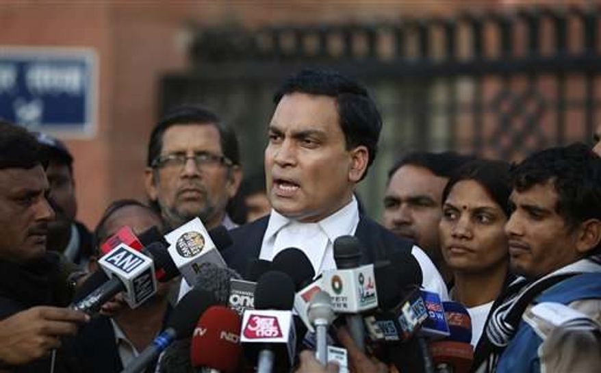 A.P Singh, lawyer for one of the accused, speaks to journalists outside the Saket district court complex where the five men facing charges of rape and murder of a 23-year-old woman aboard a moving bus in the capital last month stand trial, in New Delhi, India, Monday, Jan. 21, 2013. Legal proceedings in the fatal gang-rape attack on the student in India's capital began Monday in a new fast-track court set up to deal specifically with crimes against women that has stirred debate over how best to deliver justice to rape victims.(Associated Press)