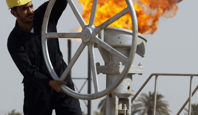After more than two decades of wars and U.N. embargoes, Iraq is back in the oil market just when demand is poised to surge in a way that threatens to drive up prices to destabilizing levels. (Associated Press)