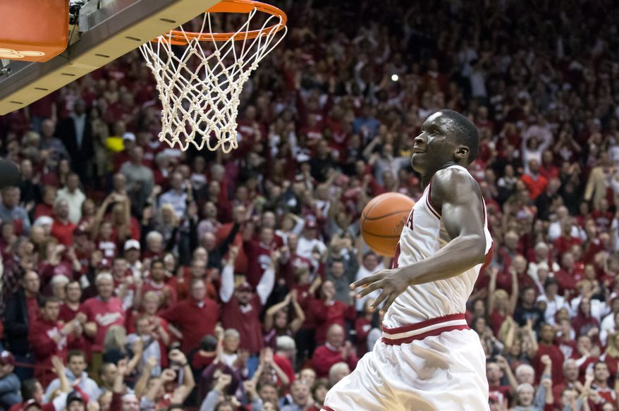 Indiana's Victor Oladipo (4) drives toward the basket for a slam dunk during the second half of an NCAA college basketball game Saturday, Feb. 2, 2013, in Bloomington, Ind. Indiana defeated Michigan 81-73. (AP Photo/Doug McSchooler)