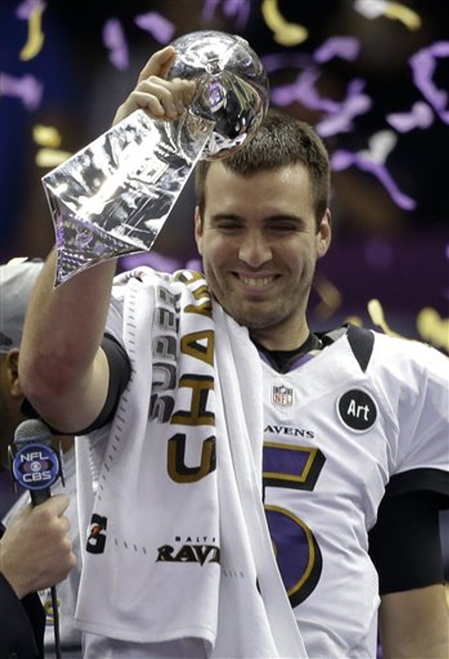Baltimore Ravens quarterback Joe Flacco holds up the Vince Lombardi Trophy after their 34-31 win against the San Francisco 49ers in the NFL Super Bowl XLVII football game Sunday, Feb. 3, 2013, in New Orleans. (AP Photo/Marcio Sanchez)