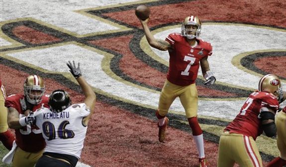 San Francisco 49ers quarterback Colin Kaepernick (7) passes the ball against the Baltimore Ravens during the first half of the NFL Super Bowl XLVII football game Sunday, Feb. 3, 2013, in New Orleans. (AP Photo/Charlie Riedel) 